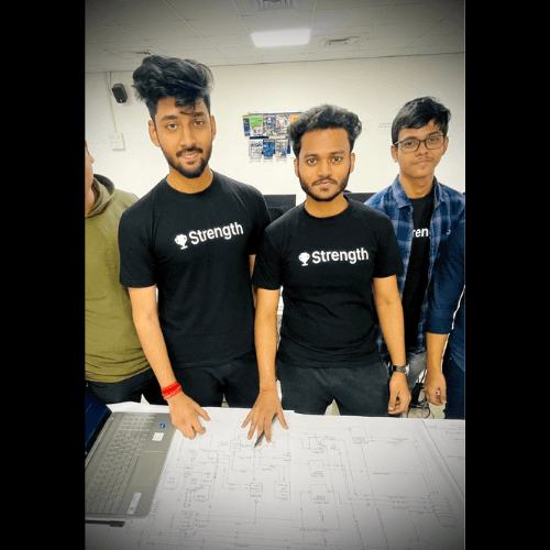 Strength team members looking at plans